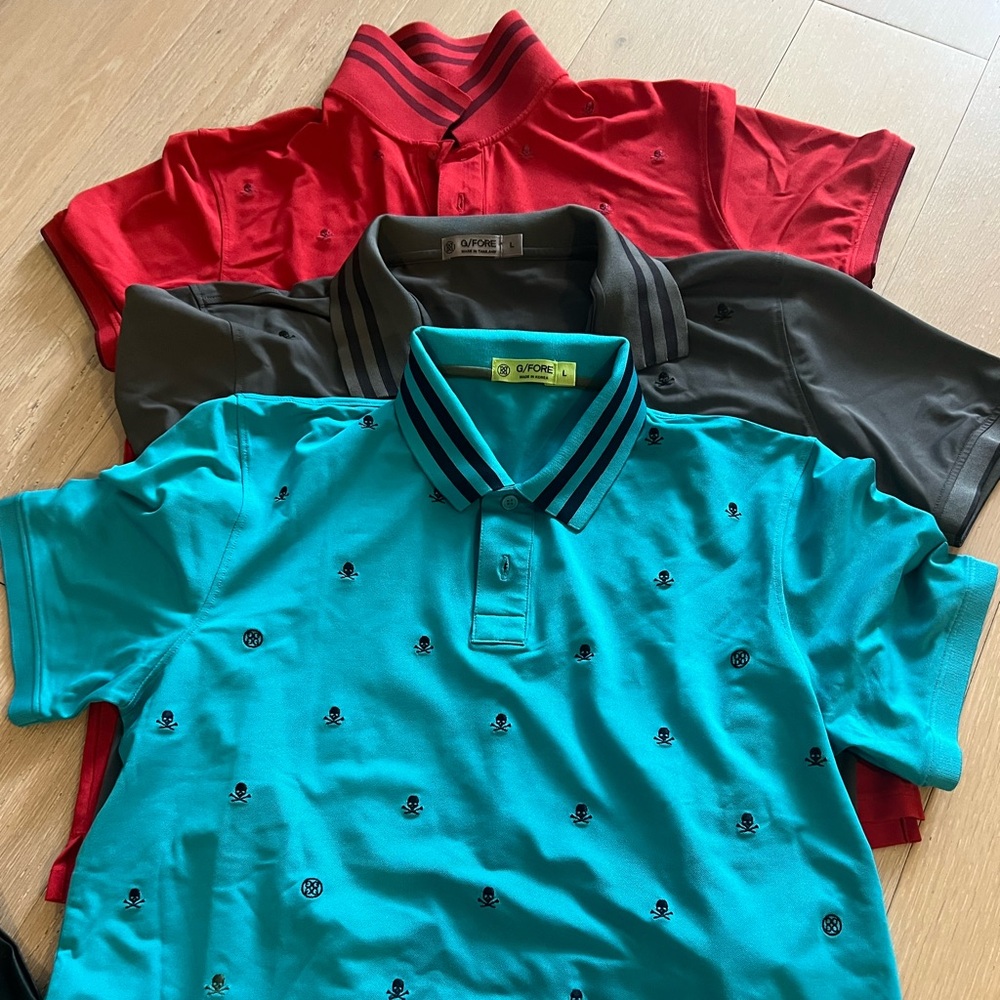 A bundle of three polo shirts